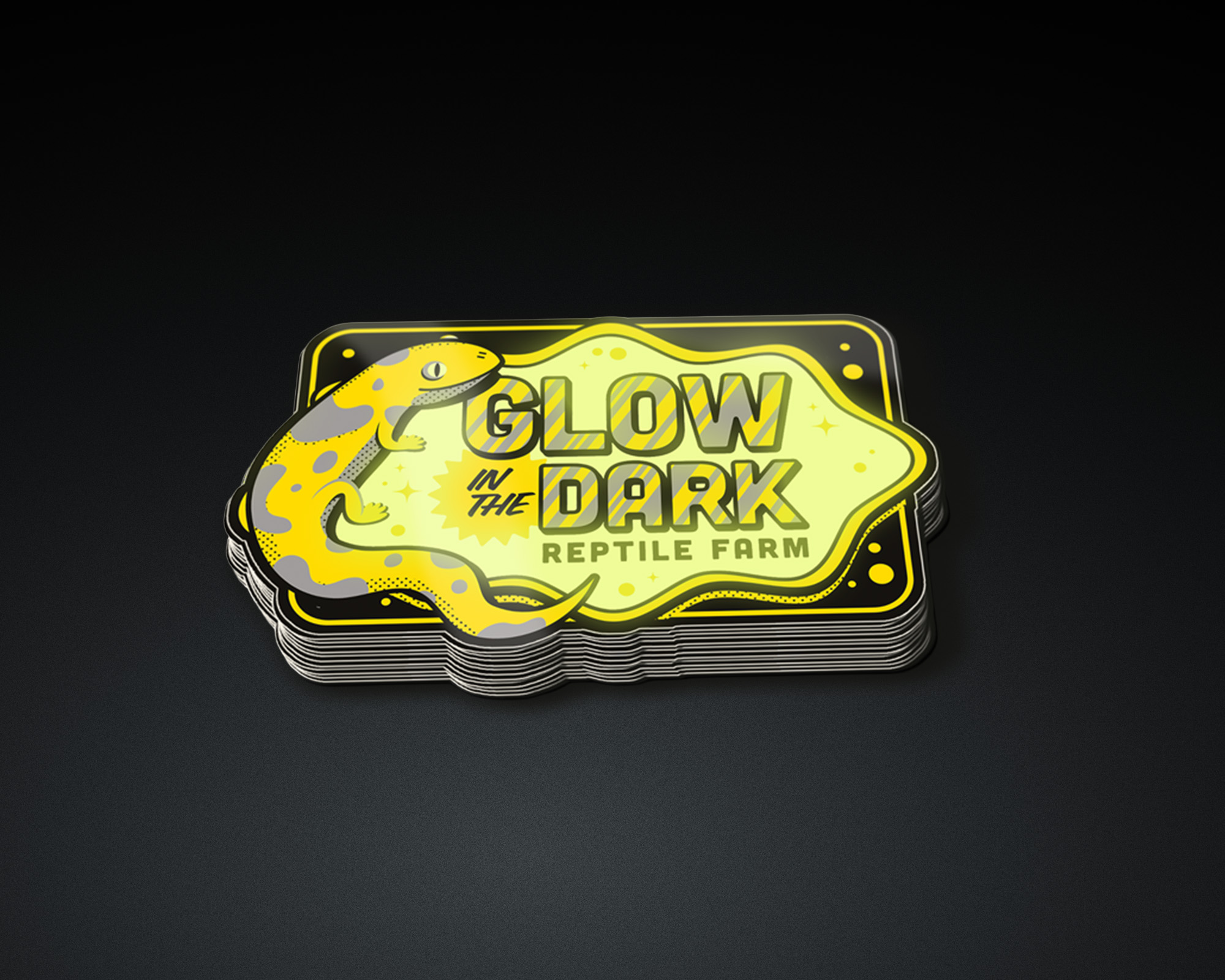 Stack of "Glow in the Dark Reptile Farm" stickers featuring a cartoon snake and glowing text on a black background.